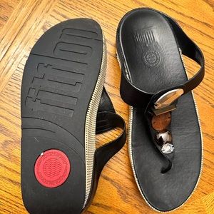 Almost brand new FitFlop flip flops. Size 11. Worn just a few times!
